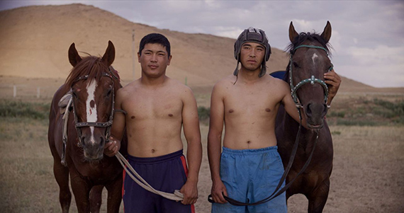 Alexey Morosov, video projection with Kyrgyz dams and sequences of kok-boru, film still