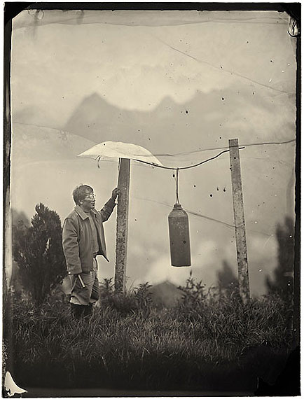Luo Dan: Simple Song No. 25, John ringing the bell, Laomudeng Village, 201030 x 21cm - Edition of 20; 147.3 x 111.8cm - Edition of 8, Pigment Print on Fiber Paper © Luo Dan