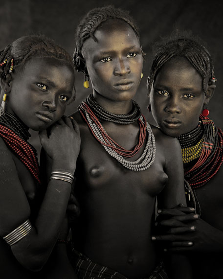 © JIMMY NELSON, BODITA, ARBOSHASH & NIRJUDA, DASSANECH TRIBE OMORATE VILLAGE, SOUTHERN OMO VALLEY, ETHIOPIA, 2011