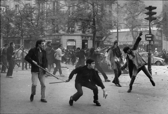 BRUNO BARBEYMay 1968, Paris. 6th arrondissement. Boulevard Saint Germain. Students hurling projectiles against the police.Vintage Print11.8 x 14.1 inches© Bruno Barbey / Magnum Photos