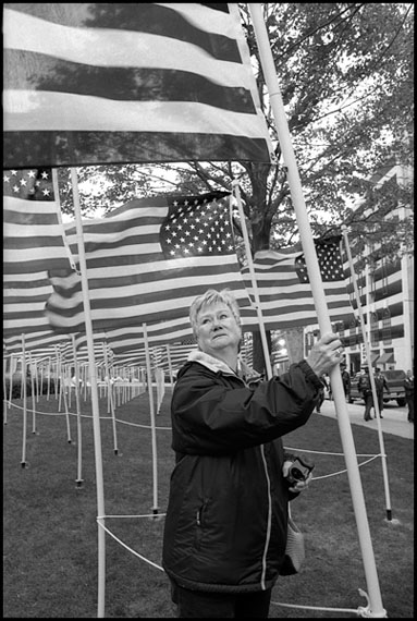 Marissa Roth: Beckie Dixon With Her Son Christopher’s Memorial Flag, Columbus, Ohio 2005
