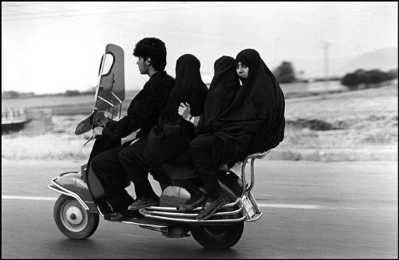 Young man, three veiled girls in a four-seater motorbike. Shahr Rey, Iran. 1997© Abbas/Magnum Photos