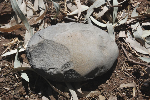 Brenda L Croft: Stone Axe from Bore 17, 11 June 2014, from the series Self-portraits on country. Pigment print, 42 x 59.5cm