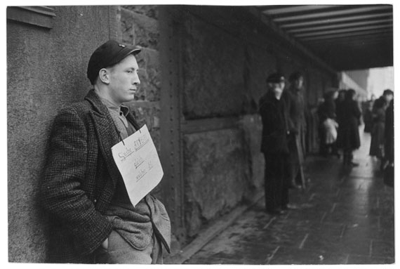 Henri Cartier-Bresson, “I am looking for any kind of work”, sign hanging around the neck of this young German, Hamburg, West Germany, 1952 © Henri Cartier-Bresson/Magnum Photos