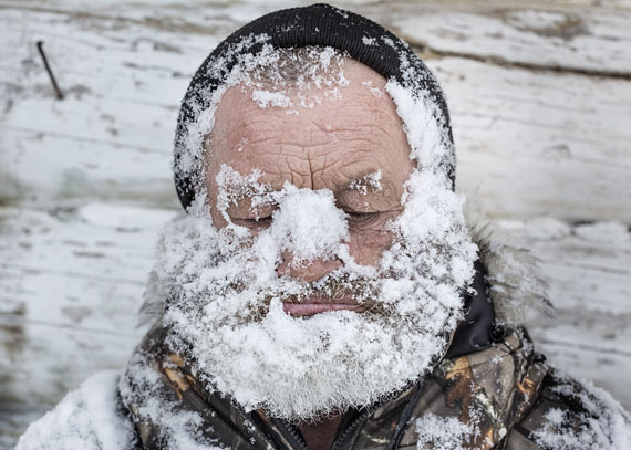 © Elena AnosovaOut-of-the-Way - Daily Life, second prize storiesA local hunter washes his face with snow near the Nizhnyaya Tunguska River, in the far north of Russia. March 18, 2016