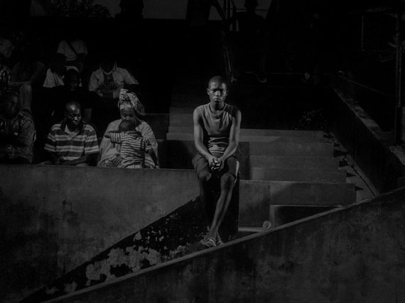 Republic of Congo, 2013, Scene #9928 © Alex Majoli / Magnum Photos Brazzaville stadium, with Red Devils supporters.