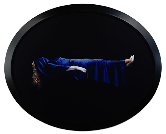 Sarah CharlesworthLevitating Woman, 1992-93Cibachrome print with lacquered wood frame, edition of 6 +2 APs43 1/2 × 53 1/4 x 1 1/8 inchesCourtesy of Paula Cooper Gallery, New York© The Estate of Sarah Charlesworth
