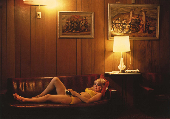 Marvin E. NewmanWoman Lying Down on Couch, Mustang Ranch, Reno, Nevada, 1971Archival pigment print, printed later by the artist38 x 54 cm