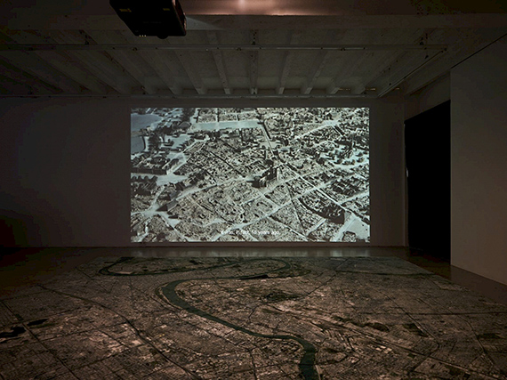 Hiwa K, View from Above, 2017. Single channel HD video, 16:9, color, sound (with English language), 12:27 min. Installation view at KOW, Berlin. Courtesy Kow, Berlin and the artist
