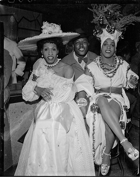 Charles 'Teenie' Harris, seated between drag performers Gilda and Junie Turner wearing Caribbean-style costume.
CARNEGIE MUSEUM OF ART
