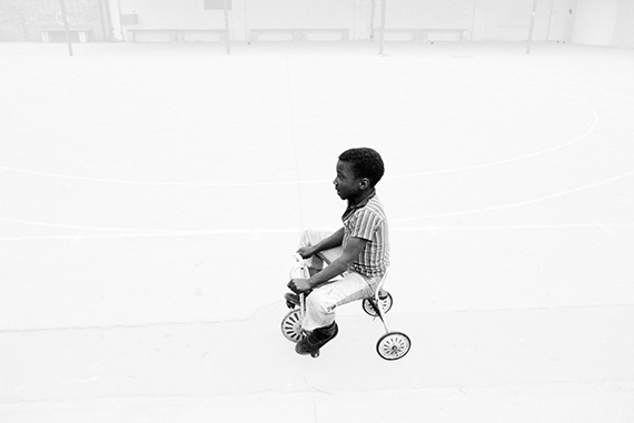 Boy tricycle © Dennis Morris