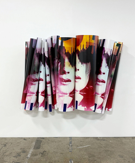 Carrie Schneider. Eve I (bloodline), 2025. single unique chromogenic photograph made in camera. 50” x 33.3’ (127 x 1016 cm). installed 60” x 66” x 19” (152.4 x 167.6 x 48.3 cm). Image Credit: © Carrie Schneider, courtesy of the artist and David Peter Francis, New York