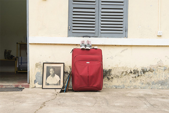 Portraits of contemporary witnesses of the independence movement in Ghana are packed for archiving. Dzifa Peters in collaboration with Josef Zky, from the project “Being a guest”, (2015-present), C-print © Dzifa Peters 2025, courtesy of the artists 