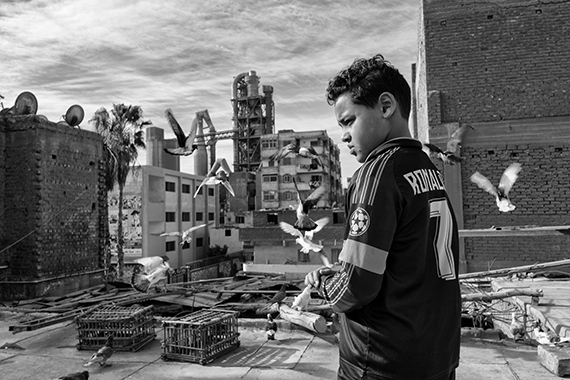 Moon Dust&copy; Mohamed Mahdy, Arab Documentary Photography ProgramAwady, who was born with asthma, raises pigeons as a hobby. “Every day, I am afraid I won’t be able to play football again,” he says. Alexandria, Egypt, 14 February 2018.
