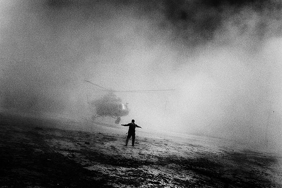 A helicopter used by the Drug Enforcement Agency and Afghan troops lands in Kabul, Afghanistan, after completing a mission. 2006.© Paolo Pellegrin / Magnum Photos