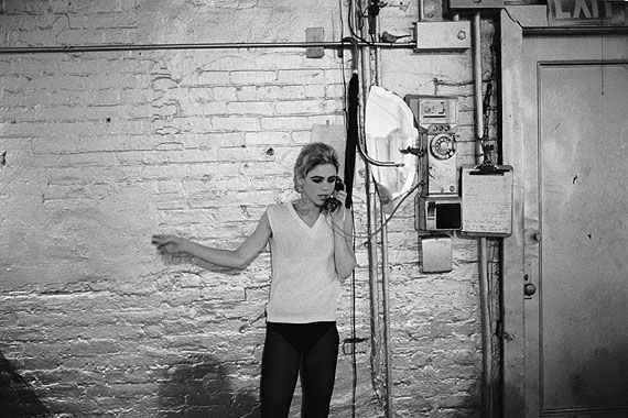 Stephen Shore. Edie Sedgwick using the only phone at The Factory, NYC, ca. 1965-1967. Courtesy Stephen Shore / 303 Gallery, New York. © Stephen Shore