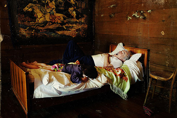 Nap. The grandfather telling a story to his granddaughter [Oni, Ratcha region] ©Petr Lovigin/courtesy°CLAIR Gallery