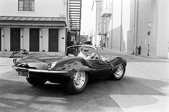Steve McQueen in black Jaguar at studio, California, 1963. © John Dominis / Time Inc. All Rights Reserved.