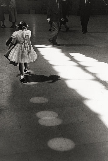 © Louis Stettner "Girl Dancing in Circles, Penn Station 1958"