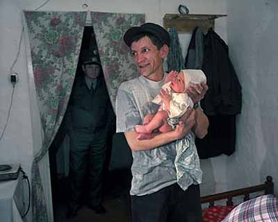 Carl De KeyzerPrisoners' village: birth of baby © Magnum Photos