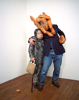 Tatsumi Orimoto . Bread Men  1991/2007colour photograph53,9 x 36 cm courtesy: DNA, Berlin www.dna-galerie.de