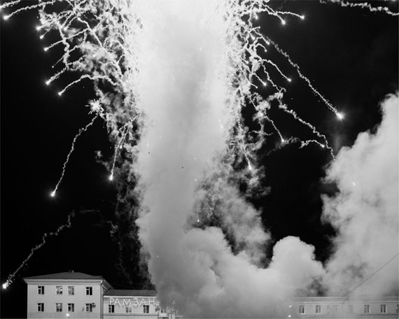 Davide Monteleone: Spasibo, Republic of Chechnya, Russia, 03/2013, © Davide Monteleone/VII for Carmignac Gestion Photojournalism Award.Fireworks in the city’s main square to mark the 10th Constitution Day celebration. At the end of the Second Chechen War, Russia installed a pro-Moscow Chechen regime. In 2003 a referendum was held on a constitution that reintegrated Chechnya within Russia, but limited local autonomy. According to the Chechen government, the referendum drew a turnout of nearly 80% and passed with 95.5% of the vote. Grozny, March 23rd 2013.