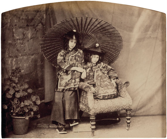 LEWIS CARROLL (1832-1898)Lorina and Alice Liddell in Chinese Costume, c. 1860Album printImage/sheet: 5 x 6 ½ in. (14 x 16 cm.)$10,000- 15,000