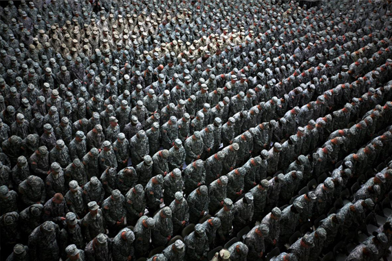 Ashley Gilbertson
1,215 American soldiers, airmen, Marines and sailors pray before a pledge of enlistment on July 4, 2008, at a massive re-enlistment ceremony at one of Saddam Hussein's former palaces in Baghdad, Iraq 2008
from Whiskey Tango Foxtrot series
type C photograph
69.0 x 94.0 x 5.5 cm
Courtesy of the artist
© Ashley Gilbertson / VII Network