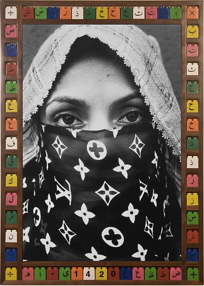 Hassan HajjajEyes on me, 2000 / 1421Digital C Type on Fuji Crystal Archive PaperFrame: Wood with Arabic Alphabet LegosFramed: 62 x 87 x 4 cmEdition of 10 plus 3 ap