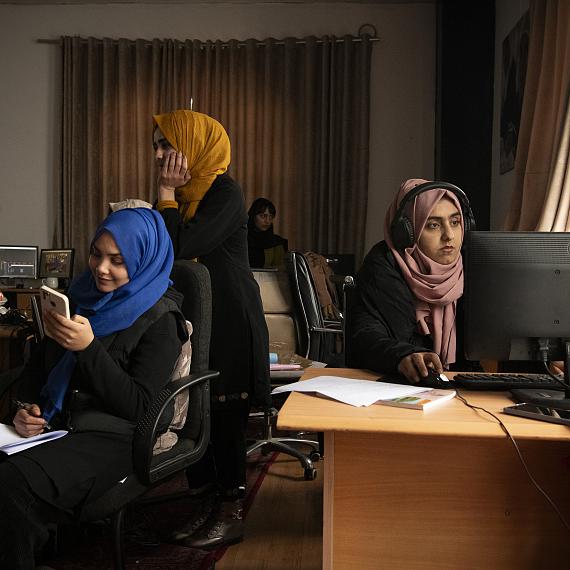 Kabul, Kabul, Afghanistan, February 29, 2024. Female journalists working in the office of a women-focused media. Since the Taliban came to power in August 2021, the Afghan media landscape has been decimated. © Kiana Hayeri for Fondation Carmignac
