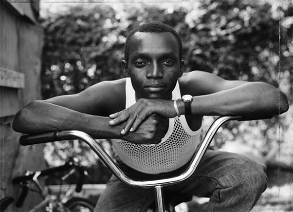 Dawoud Bey, A Young Man Resting on an Exercise Bike, Amityville, NY, #
from the series Street Portraits, 1988. 
Pigment print. 
Courtesy the artist and Stephen Daiter Gallery, Chicago. 
© Dawoud Bey