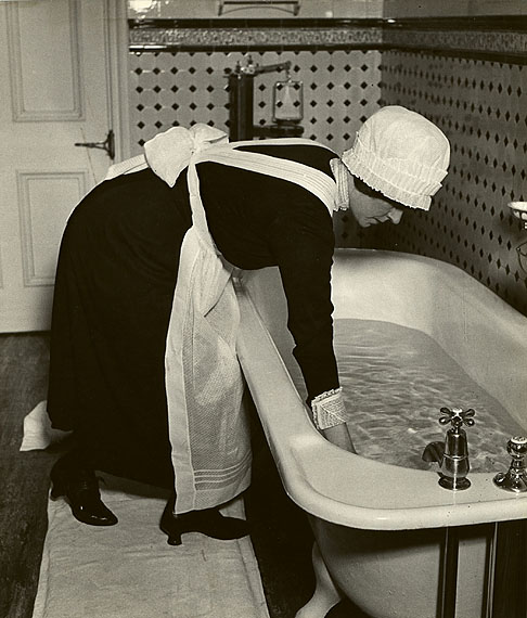 Parlourmaid Preparing a Bath Before Dinner, c. 1937© Bill Brandt Archive Ltd.Courtesy Edwynn Houk Gallery